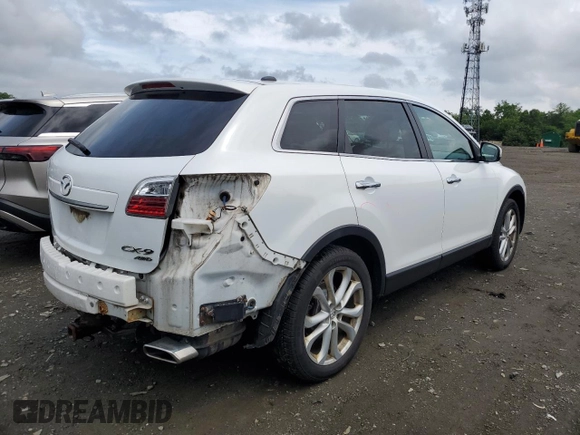 2012 Mazda CX-9 Grand Touring with VIN JM3TB3DV9C0338460, listed as a Copart auction lot 59548495 with 219,060 mi miles and Salvage title. Bid and sale history available at DreamBid. Image 3.