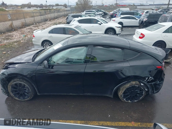 2023 Tesla Model Y Long Range with VIN 7SAYGDEE5PF766685, listed as a IAAI auction lot 41933729 with 25,959 mi miles and . Bid and sale history available at DreamBid. Image 13.