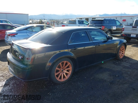2006 Chrysler 300 C SRT8 with VIN 2C3LA73W06H370568, listed as a IAAI auction lot 41982346 with 133,209 mi miles. Bid and sale history available at carsss.com. Image 4.