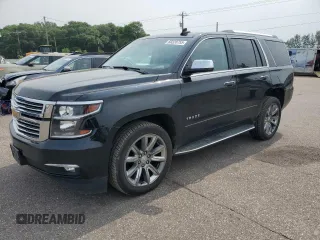 2017 Chevrolet Tahoe Premier with VIN 1GNSKCKC9HR408202, listed as a Copart auction lot 60320755 with 90,937 mi miles and Salvage title. Bid and sale history available at DreamBid. Image 1.