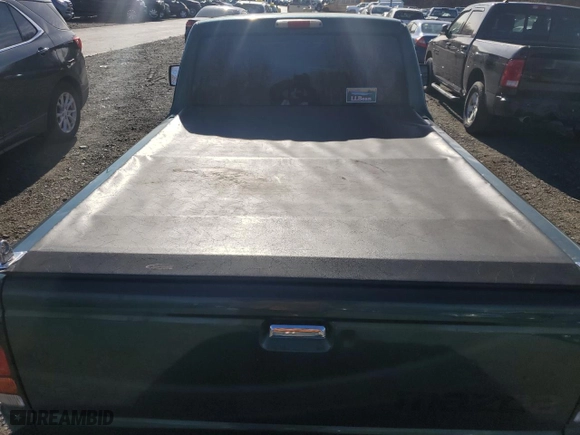 1999 Mazda B-Series 2WD Truck SX with VIN 4F4YR12CXXTM22301, listed as a Copart auction lot 80465464 with 98,031 mi miles and Salvage Title. Bid and sale history available at carsss.com. Image 10.