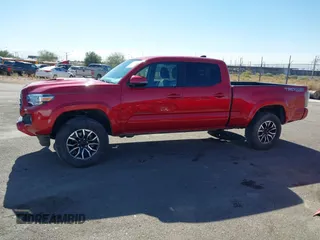 2021 Toyota Tacoma 4WD SR5 with VIN 3TMDZ5BN3MM102098, listed as a IAAI auction lot 41381650 with 30,642 mi miles. Bid and sale history available at carsss.com. Image 14.