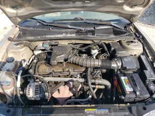 2002 Pontiac Sunfire SE z VIN 1G2JB524327349633, wystawiony jako Copart lot #77403974 z przebiegiem 157 610 mil mil oraz Szkoda całkowita • Salvage title. Historia ofert i sprzedaży dostępna na DreamBid. Obrazek 11.