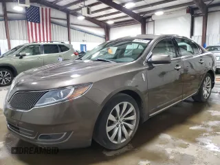 2016 Lincoln MKS z VIN 1LNHL9DK1GG600467, wystawiony jako Copart lot #60660915 z przebiegiem 90 180 mil mil oraz Czysty tytuł • Clean title. Historia ofert i sprzedaży dostępna na DreamBid. Obrazek 1.