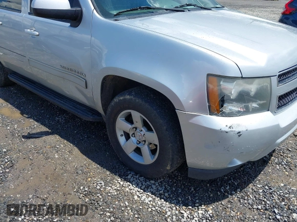 2012 Chevrolet Suburban LT z VIN 1GNSCJE01CR143982, wystawiony jako IAAI lot #42257552 z przebiegiem 202 973 mil mil oraz . Historia ofert i sprzedaży dostępna na DreamBid. Obrazek 6.