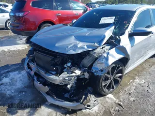 2019 Honda Civic Sport with VIN 2HGFC2F85KH605786, listed as a IAAI auction lot 41621480 with 66,438 mi miles and . Bid and sale history available at DreamBid. Image 6.