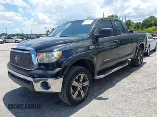 2012 Toyota Tundra z VIN 5TFRY5F17CX128888, wystawiony jako IAAI lot #42508395 z przebiegiem 279 524 mil mil oraz . Historia ofert i sprzedaży dostępna na DreamBid. Obrazek 17.