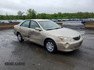 2002 Toyota Camry LE z VIN 4T1BE32K42U623283, wystawiony jako Copart lot #55631065 z przebiegiem 96 830 mil mil oraz Szkoda całkowita • Salvage title. Historia ofert i sprzedaży dostępna na DreamBid. Obrazek 4.