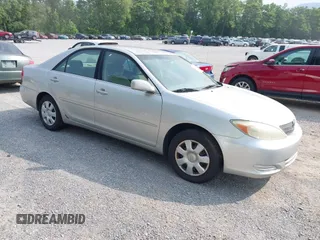 2002 Toyota Camry LE z VIN 4T1BE32K32U632539, wystawiony jako IAAI lot #42406278 z przebiegiem 297 039 mil mil oraz . Historia ofert i sprzedaży dostępna na DreamBid. Obrazek 1.
