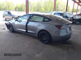 2025 Tesla Model 3 Long Range with VIN 5YJ3E1EB4SF943771, listed as a IAAI auction lot 42330181 with 3,533 mi miles and . Bid and sale history available at DreamBid. Image 3.