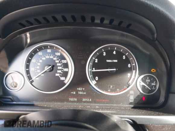2015 BMW 5 Series 528i with VIN WBA5A5C5XFD520132, listed as a IAAI auction lot 41433751 with 76,576 mi miles and . Bid and sale history available at DreamBid. Image 7.