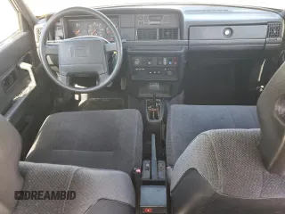 1993 Volvo 240 with VIN YV1AS8807P1483020, listed as a Copart auction lot 61060095 with 131,000 mi miles and Salvage title. Bid and sale history available at DreamBid. Image 8.