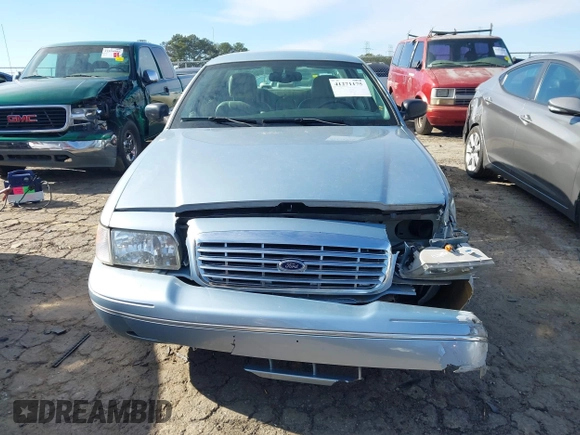 2005 Ford Crown Victoria LX z VIN 2FAFP74W65X135964, wystawiony jako IAAI lot #41271175 z przebiegiem 82 494 mil mil oraz . Historia ofert i sprzedaży dostępna na DreamBid. Obrazek 12.
