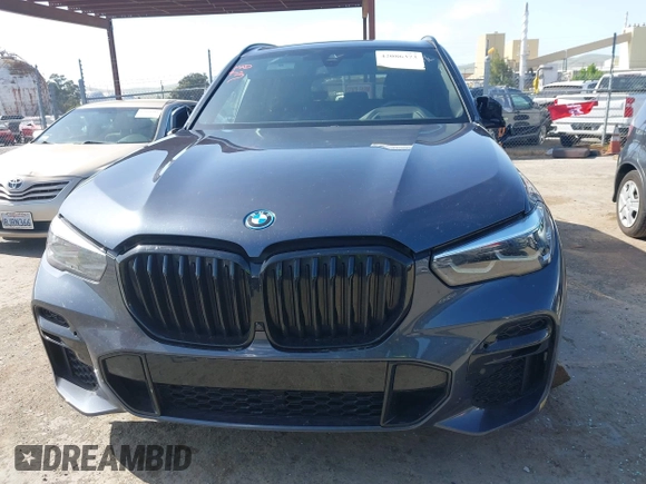 2022 BMW X5 xDrive45e with VIN 5UXTA6C07N9J29881, listed as a IAAI auction lot 42086373 with 63,510 mi miles and . Bid and sale history available at DreamBid. Image 12.