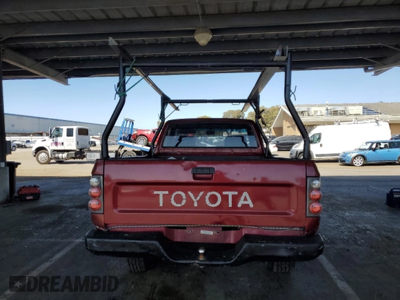 1991 Toyota Pickup with VIN JT4RN81A8M0064727, listed as a Copart auction lot 61271465 with 226,758 mi miles and Salvage title. Bid and sale history available at DreamBid. Image 6.