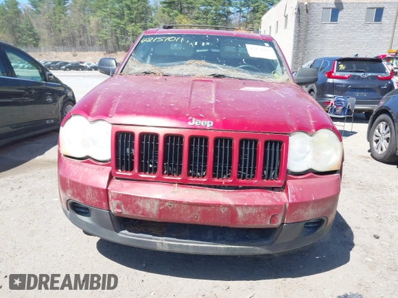 2009 Jeep Grand Cherokee Laredo with VIN 1J8GR48K79C543304, listed as a IAAI auction lot 42151011 with 157,679 mi miles. Bid and sale history available at carsss.com. Image 6.