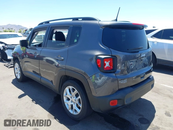 2018 Jeep Renegade Latitude with VIN ZACCJABB5JPJ63878, listed as a IAAI auction lot 42282707 with 90,572 mi miles and . Bid and sale history available at DreamBid. Image 3.