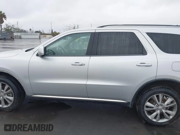 2013 Dodge Durango Crew z VIN 1C4RDJDGXDC637572, wystawiony jako IAAI lot #41922757 z przebiegiem 110 941 mil mil oraz . Historia ofert i sprzedaży dostępna na DreamBid. Obrazek 15.