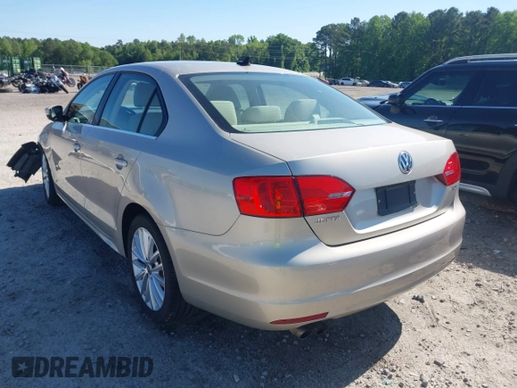 2013 Volkswagen Jetta TDI w/Premium/Nav with VIN 3VWLL7AJXDM233999, listed as a IAAI auction lot 42126691 with 151,658 mi miles and . Bid and sale history available at DreamBid. Image 3.