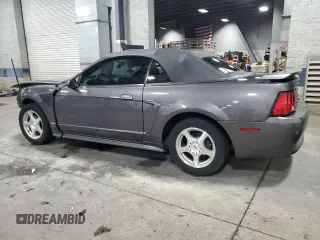 2003 Ford Mustang Deluxe z VIN 1FAFP44433F369534, wystawiony jako Copart lot #76606794 z przebiegiem 88 503 mil mil oraz Szkoda całkowita • Salvage title. Historia ofert i sprzedaży dostępna na DreamBid. Obrazek 2.