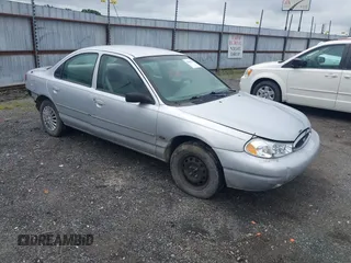 2000 Ford Contour SE Fleet z VIN 1FAFP6630YK140498, wystawiony jako IAAI lot #42201222 z przebiegiem 264 655 mil mil oraz . Historia ofert i sprzedaży dostępna na DreamBid. Obrazek 1.
