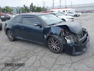 2015 Scion tC z VIN JTKJF5C72F3094052, wystawiony jako IAAI lot #42101257 z przebiegiem 114 851 mil mil oraz . Historia ofert i sprzedaży dostępna na DreamBid. Obrazek 1.