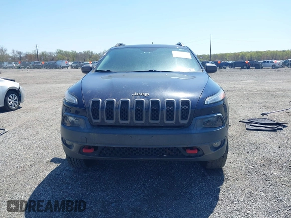 2015 Jeep Cherokee Trailhawk z VIN 1C4PJMBS3FW520829, wystawiony jako IAAI lot #42065548 z przebiegiem 90 534 mil mil oraz . Historia ofert i sprzedaży dostępna na DreamBid. Obrazek 12.