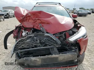2022 Toyota Corolla Cross XLE with VIN 7MUDAAAG7NV019610, listed as a Copart auction lot 55146165 with 13,633 mi miles and Salvage title. Bid and sale history available at DreamBid. Image 12.