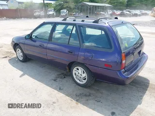 1997 Ford Escort LX with VIN 3FALP15P3VR155580, listed as a IAAI auction lot 42602727 with 38,552 mi miles and . Bid and sale history available at DreamBid. Image 3.