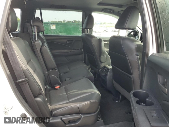 2023 Honda Passport EX-L with VIN 5FNYF8H58PB024039, listed as a Copart auction lot 57269725 with 44,705 mi miles and Salvage title. Bid and sale history available at DreamBid. Image 11.