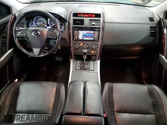 2015 Mazda CX-9 Grand Touring z VIN JM3TB3DVXF0463049, wystawiony jako Copart lot #44909745 z przebiegiem 146 534 mil mil oraz Czysty tytuł • Clean title. Historia ofert i sprzedaży dostępna na DreamBid. Obrazek 8.