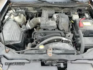 2006 Chevrolet Colorado Work Truck z VIN 1GCDT196368145145, wystawiony jako Copart lot #82851984 z przebiegiem 146 938 mil mil oraz Czysty tytuł • Clean title. Historia ofert i sprzedaży dostępna na DreamBid. Obrazek 13.