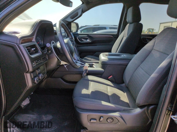 2023 Chevrolet Suburban LS with VIN 1GNSCBKD1PR132161, listed as a Copart auction lot 70649614 with 24,850 mi miles and Salvage Title. Bid and sale history available at DreamBid. Image 7.