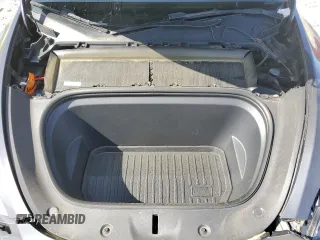 2023 Tesla Model Y Long Range z VIN 7SAYGAEE9PF662103, wystawiony jako Copart lot #51332105 z przebiegiem 35 294 mil mil oraz Szkody całkowita. Historia ofert i sprzedaży dostępna na DreamBid. Obrazek 11.