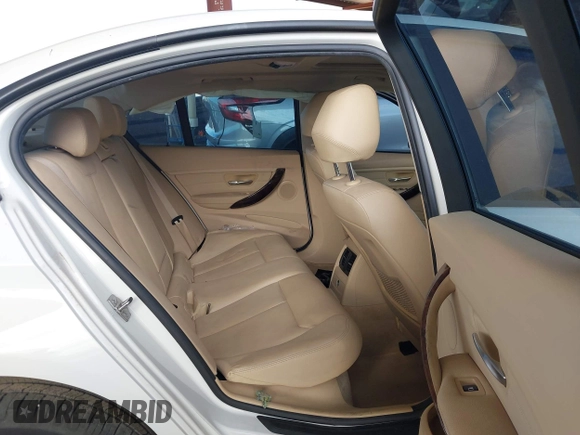 2014 BMW 3 Series 328i with VIN WBA3C1C53EK113046, listed as a IAAI auction lot 42665663 with Not provided miles and . Bid and sale history available at DreamBid. Image 8.