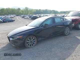 2021 Mazda 3 Premium z VIN 3MZBPADL2MM254467, wystawiony jako IAAI lot #42151557 z przebiegiem 63 282 mil mil oraz . Historia ofert i sprzedaży dostępna na DreamBid. Obrazek 18.
