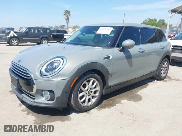 2019 MINI Clubman Cooper with VIN WMWLN5C57K2E34894, listed as a IAAI auction lot 42072962 with 49,274 mi miles and . Bid and sale history available at DreamBid. Image 2.