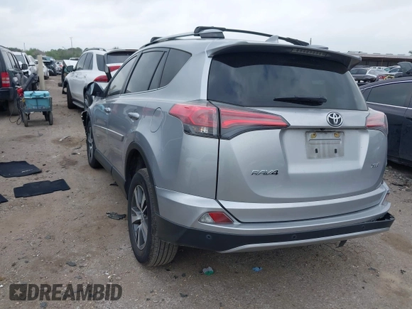 2018 Toyota RAV4 XLE with VIN JTMWFREV7JJ203609, listed as a IAAI auction lot 41938100 with 51,021 mi miles. Bid and sale history available at carsss.com. Image 3.