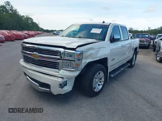 2014 Chevrolet Silverado 1500 High Country with VIN 3GCUKTEC4EG401571, listed as a IAAI auction lot 41984349 with 104,221 mi miles and . Bid and sale history available at DreamBid. Image 16.