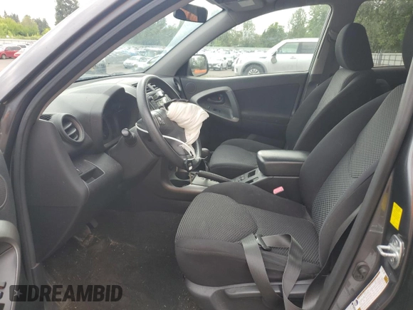 2010 Toyota RAV4 Sport with VIN JTMRF4DV2A5025473, listed as a Copart auction lot 57170405 with 171,006 mi miles and Salvage title. Bid and sale history available at DreamBid. Image 7.