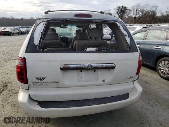2001 Chrysler Town & Country LXi with VIN 2C8GP54L11R402563, listed as a Copart auction lot 86108164 with 179,021 mi miles and Salvage Title. Bid and sale history available at DreamBid. Image 6.