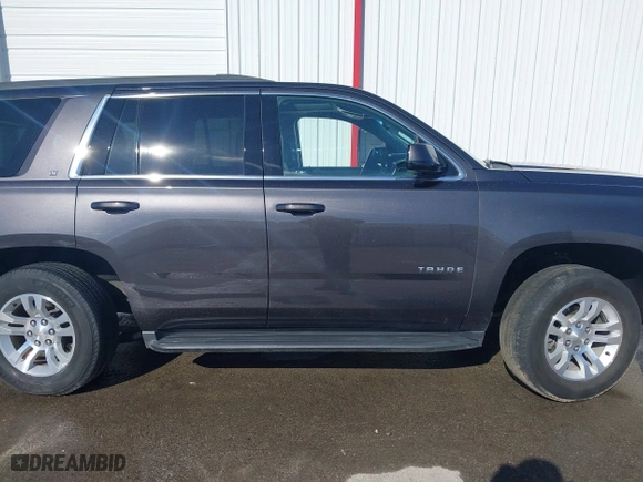 2018 Chevrolet Tahoe LT with VIN 1GNSKBKC4JR261190, listed as a IAAI auction lot 41548734 with 142,800 mi miles. Bid and sale history available at carsss.com. Image 14.