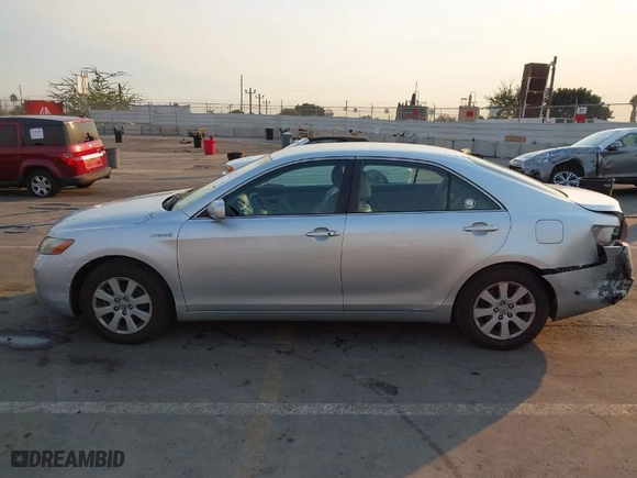2007 Toyota Camry Hybrid with VIN JTNBB46K573027590, listed as a IAAI auction lot 41307314 with 159,168 mi miles. Bid and sale history available at carsss.com. Image 14.