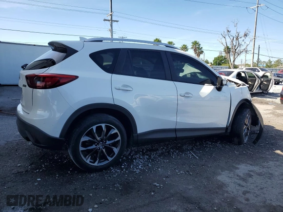 2016 Mazda CX-5 Grand Touring with VIN JM3KE4DY4G0669259, listed as a Copart auction lot 50470145 with 0 mi miles and Non Repairable. Bid and sale history available at carsss.com. Image 3.