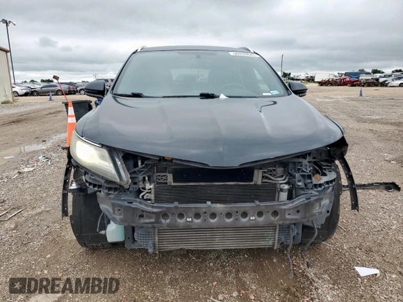 2016 Lincoln MKC Select z VIN 5LMCJ2C95GUJ27886, wystawiony jako Copart lot #60280645 z przebiegiem 165 973 mil mil oraz Szkoda całkowita • Salvage title. Historia ofert i sprzedaży dostępna na DreamBid. Obrazek 5.