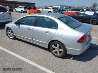 2007 Honda Civic Sdn EX with VIN 1HGFA16827L127823, listed as a IAAI auction lot 41989310 with 129,655 mi miles. Bid and sale history available at carsss.com. Image 3.