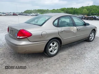 2004 Ford Taurus SES z VIN 1FAFP55S04G154644, wystawiony jako IAAI lot #42297704 z przebiegiem 155 736 mil mil oraz . Historia ofert i sprzedaży dostępna na DreamBid. Obrazek 4.