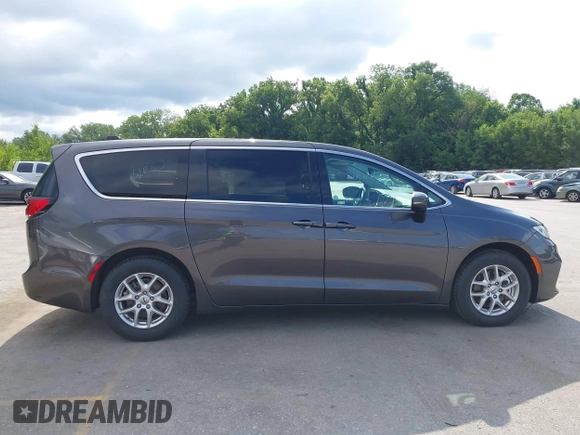 2023 Chrysler Pacifica Touring L with VIN 2C4RC1BG6PR612749, listed as a IAAI auction lot 42612932 with 69,931 mi miles and . Bid and sale history available at DreamBid. Image 13.