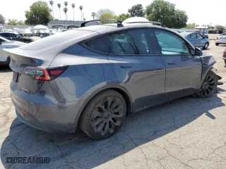 2021 Tesla Model Y Long Range with VIN 5YJYGDEEXMF070154, listed as a Copart auction lot 50742325 with 23,376 mi miles and Salvage Title. Bid and sale history available at carsss.com. Image 3.