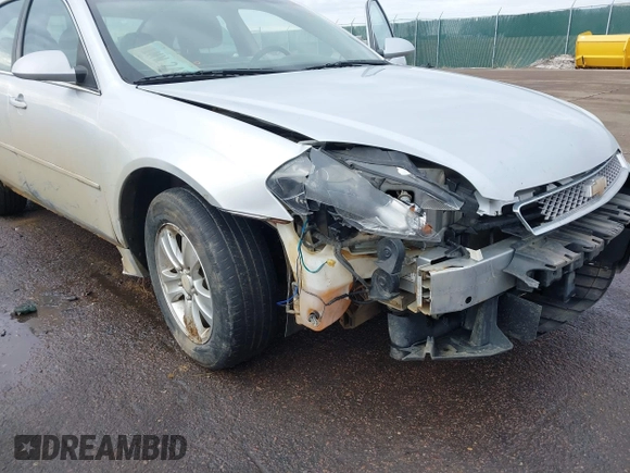 2013 Chevrolet Impala LS with VIN 2G1WF5E31D1154096, listed as a IAAI auction lot 41649749 with 204,860 mi miles and . Bid and sale history available at DreamBid. Image 6.